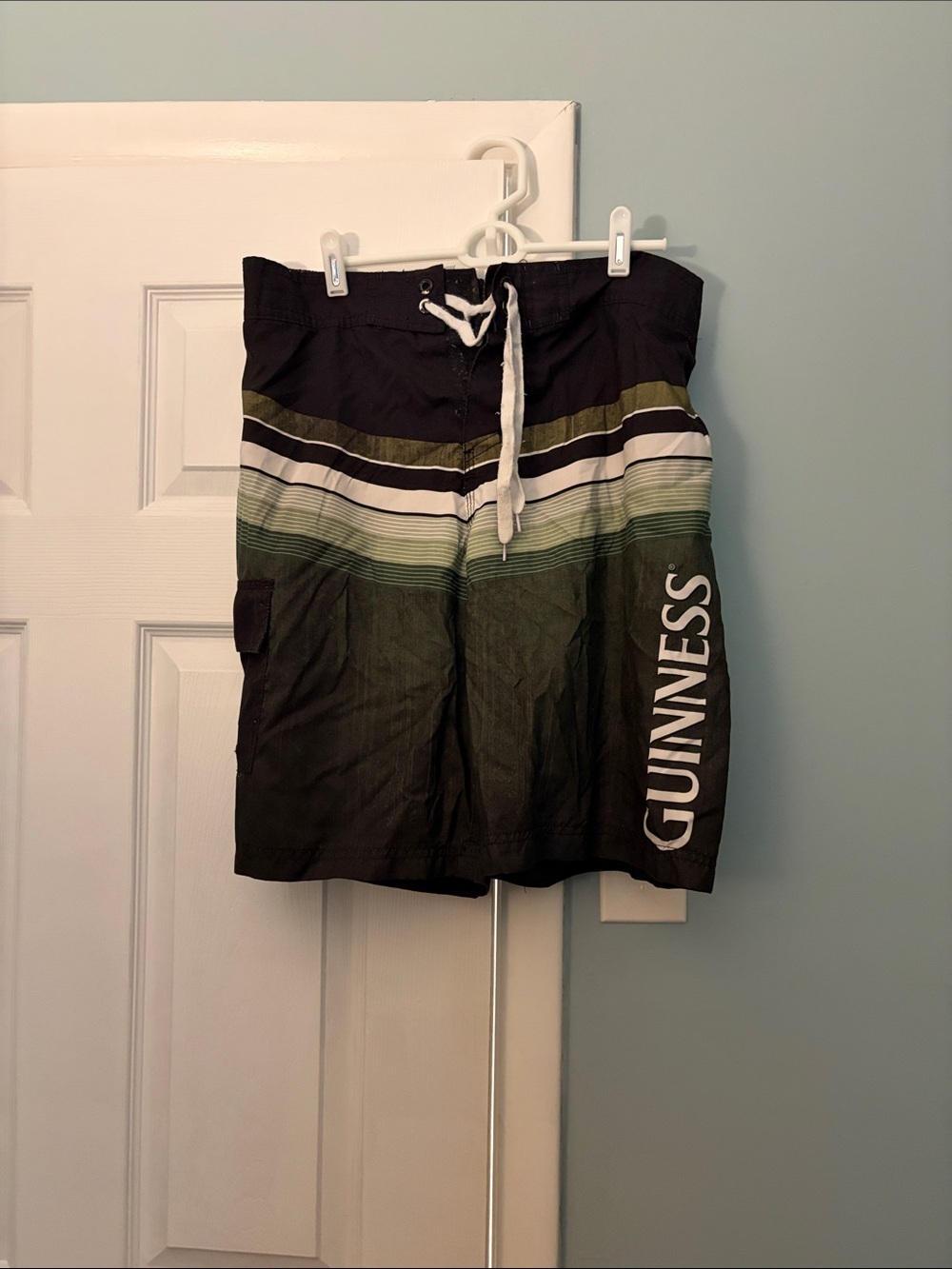 Guinness Black Swim Trunks with Green and White Stripes